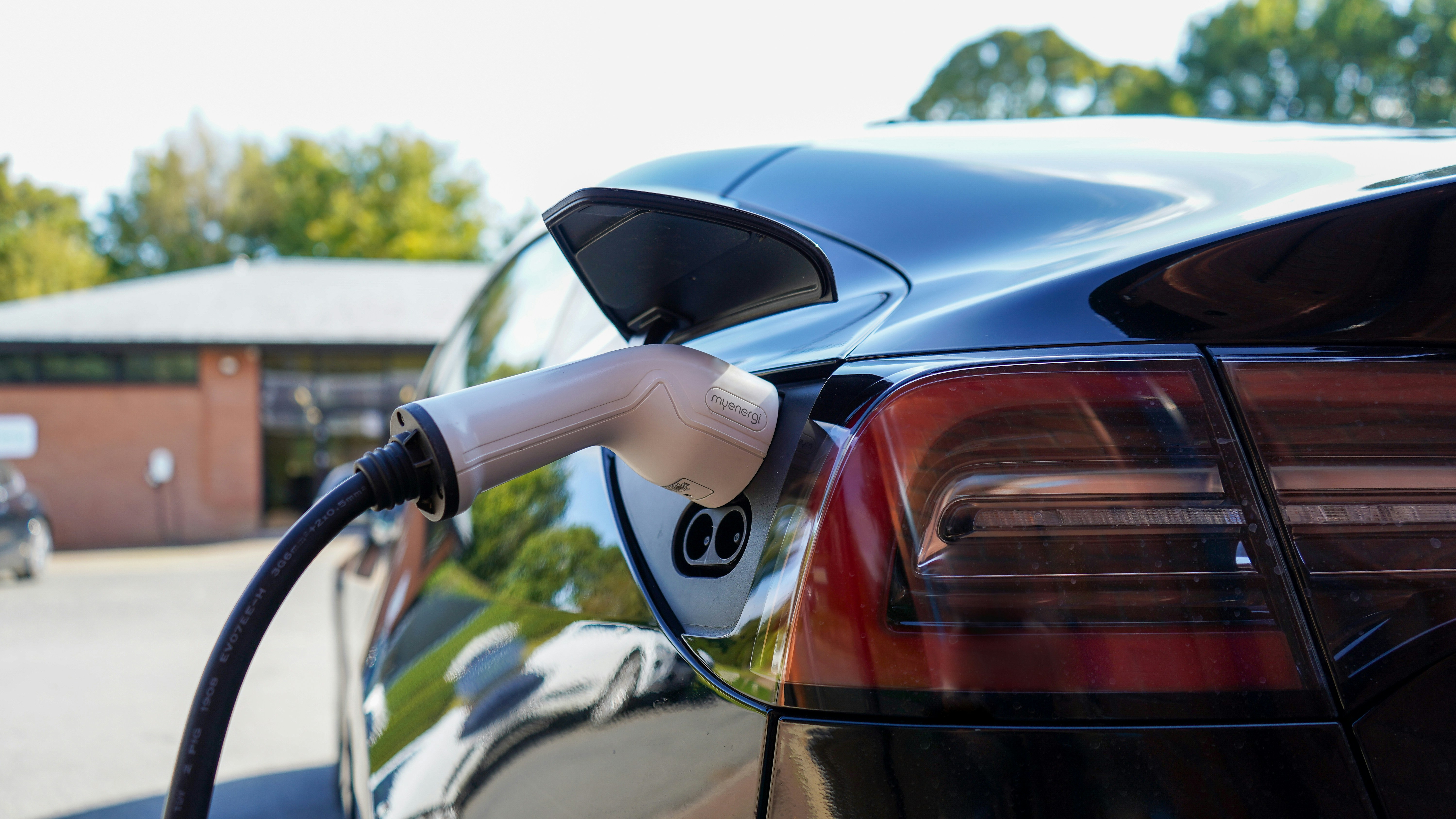 Image of solar carport charging a car